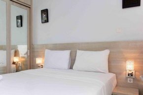 Comfy and Minimalist Studio Apartment at Mustika Golf Residence By Travelio